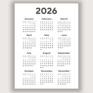 May include: A simple 2026 calendar printed on white paper. The year is in a dark grey, bold font at the top, with each month's calendar grid below. The days of the week are abbreviated, and the dates are clearly visible.