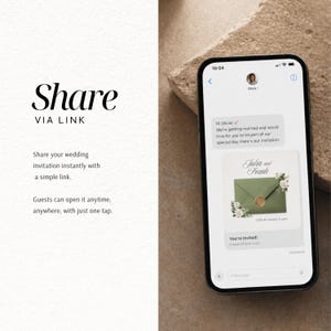 May include: A smartphone displaying a text message conversation with an invitation graphic. The graphic features a sage green envelope with a gold wax seal and white floral accents, with the text Julia and Frank and Click the envelope to open.