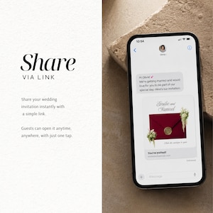 May include: A smartphone displaying a text message conversation with an invitation to a wedding for Emilie and Samuel. The digital invitation features a deep red envelope sealed with gold wax and decorated with white floral accents.