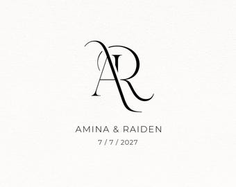 May include: A black graphic design featuring the intertwined letters A and R in a serif font. Below the monogram, the text reads AMINA & RAIDEN in a clean sans-serif typeface, followed by the date 7 / 7 / 2027 centered on a white background.