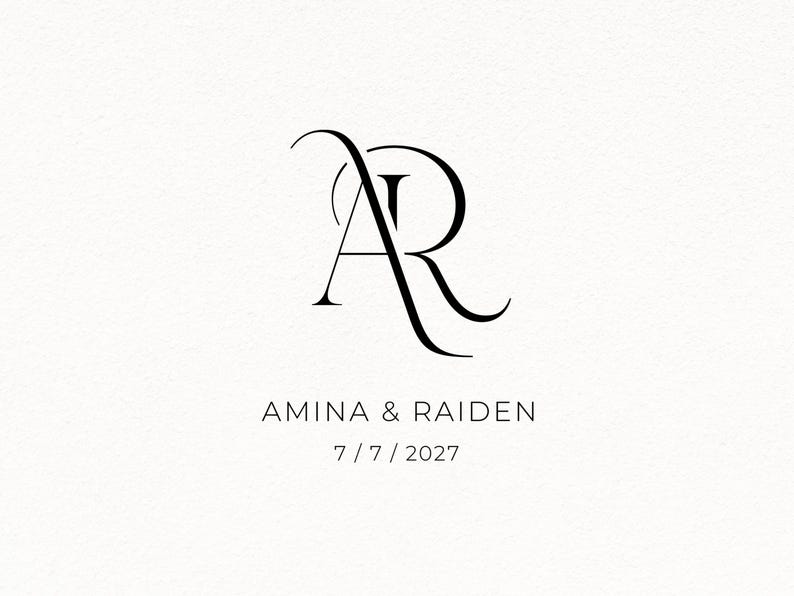 May include: A black graphic design featuring the intertwined letters A and R in a serif font. Below the monogram, the text reads AMINA & RAIDEN in a clean sans-serif typeface, followed by the date 7 / 7 / 2027 centred on a white background.