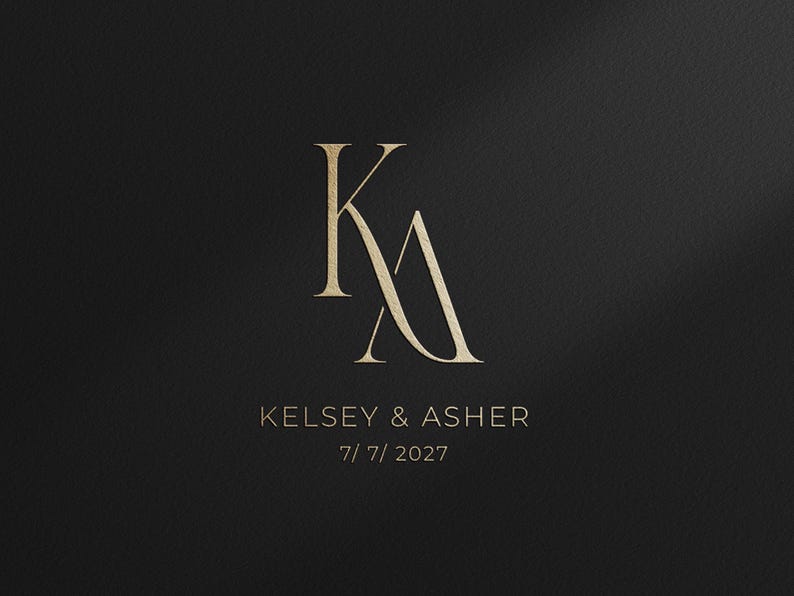 May include: A graphic design featuring a large, gold-coloured serif monogram of the letters K and A. Below the monogram, the text reads KELSEY & ASHER in a clean, sans-serif font, followed by the date 7/ 7/ 2027, all set against a solid black background.