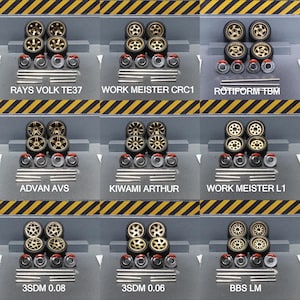 May include: A collection of miniature model car wheels, including RAYS VOLK TE37, WORK MEISTER CRC1, and ROTIFORM TBM. Each set features gold-colored rims, black tires, and silver and red components. The text "ADVAN AVS", "KIWAMI ARTHUR", "WORK MEISTER L1", "3SDM 0.08", "3SDM 0.06", and "BBS LM" are also visible.
