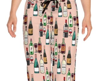 May include: Pink pajama pants with a repeating pattern of wine bottles in various colors and styles.