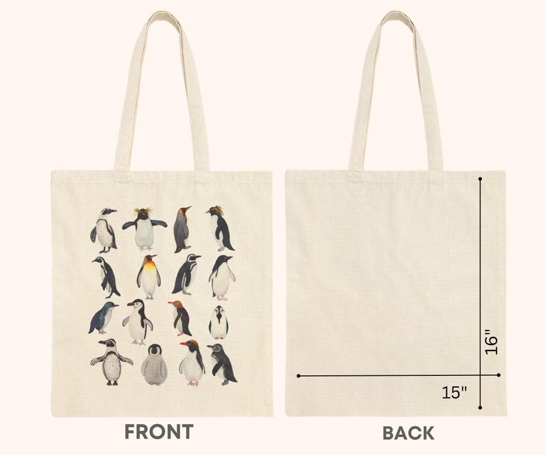May include: Cream-colored tote bag featuring a watercolor illustration of various penguin species. The bag measures 15 inches wide and 16 inches tall. The front of the bag displays the penguin artwork, while the back is plain. The bag has two long handles.