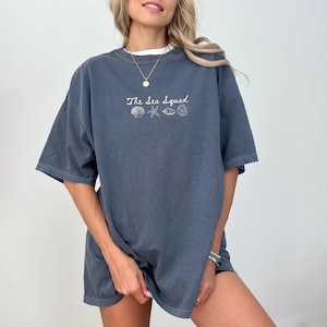 Custom Beach Bach Party Shirt, Comfort Colors Coastal Bride Tee, Seashells Wedding Bells, Sea Squad Bridal Party Gift Denim
