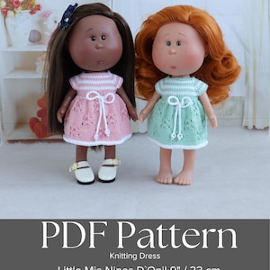 May include: Two dolls wearing knitted dresses. One doll has brown hair and a pink dress, the other has red hair and a green dress. The dresses have white accents and bows. The text "PDF Pattern Knitting Dress Little Mia Nines D'Onil 9" / 23 cm" is at the bottom.