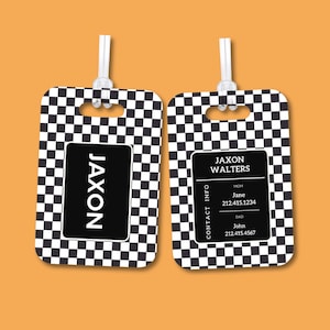 May include: Two black and white checkered luggage tags with a hole at the top for a string. The left tag has the name "Jaxon" printed in white on a black background. The right tag has the name "Jaxon Walters" printed in white on a black background. The right tag also has the words "Contact Info" printed in white on a black background. Below the name, it says "Mom Jane 212.415.1234 Dad John 212.415.4567".