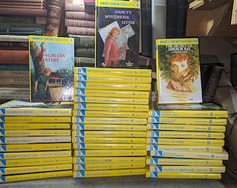 Nancy Drew Mystery Stories Carolyn Keene Yellow Glossy Hardcovers 1980's and 1990's