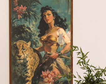 May include: A framed vintage illustration of a woman in a jungle setting. She is wearing a gold and brown bikini top and a brown skirt. She is holding a dagger in her right hand and a cheetah is standing beside her. The background is a lush green jungle with pink flowers.