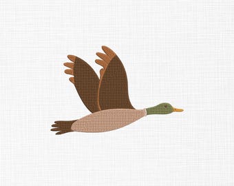 May include: A brown and tan duck with green head and yellow beak flying with wings spread out against a white background.