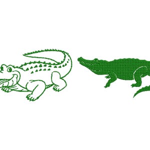 May include: Two green alligator designs on a white background. One is a cartoon-style outline with an open mouth, and the other is a solid green alligator. The image is suitable for embroidery or graphic design projects.