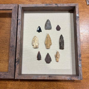 Genuine American Indian arrowheads displays, shadow box wall decor. Ancient history.