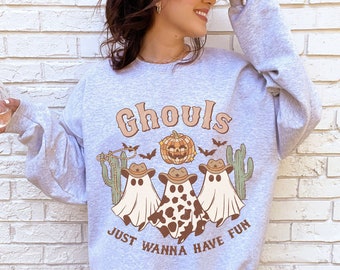May include: A grey sweatshirt with a graphic of three ghosts wearing cowboy hats and the text "Ghouls Just Wanna Have Fun".
