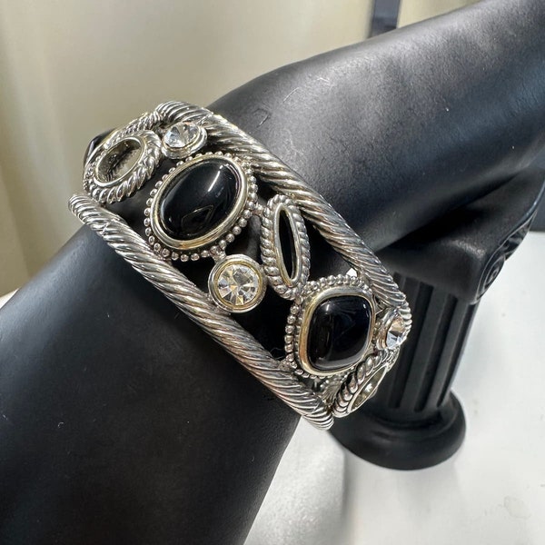 Cuff bracelet with simulated stones. 925 sterling silver and black ring with CZ.