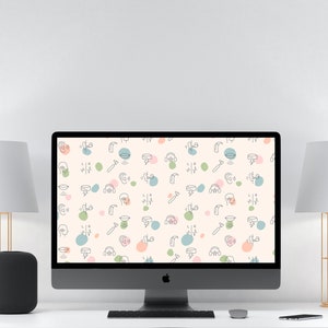 May include: A computer monitor displaying a desktop background with a pattern of various pastel-colored shapes and line drawings of ears, microphones, and sound waves.