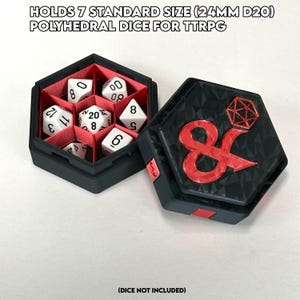 May include: A black hexagonal dice box with a red and white dice symbol on the lid. The box is open, revealing a red and black interior with seven white dice. The text "HOLDS 7 STANDARD SIZE (24MM D20) POLYHEDRAL DICE FOR TTRPG" is at the top of the image. The text "(DICE NOT INCLUDED)" is at the bottom of the image.