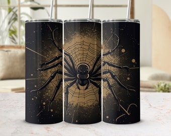 May include: Three stainless steel tumblers with a black and gold spider web design. The spider is black and has eight legs. The design is on a black background with gold accents.