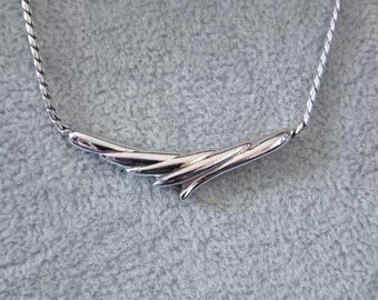 Napier statement silver tone triangle twist necklace