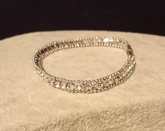 Vintage silver tone and rhinestone tennis bracelet