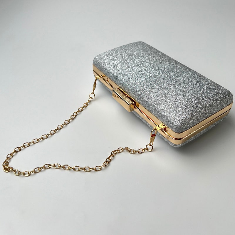 Stunning Sparkling V Shape Metal Splicing Clutch Bag