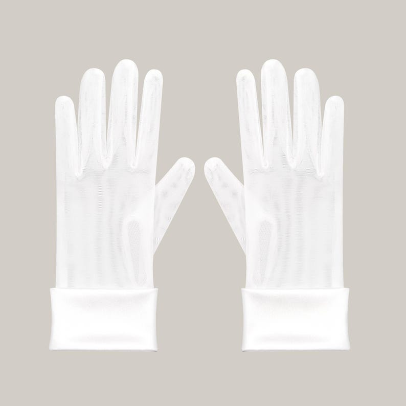 May include: A pair of white gloves with a sheer, textured appearance. The gloves have a cuff at the wrist. The background is a solid, neutral color.