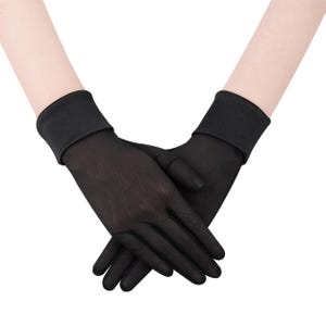 May include: A pair of sheer black gloves. The gloves are made of a lightweight, see-through material. The cuffs are solid black and fit snugly around the wrists. The gloves are designed to cover the entire hand and fingers.