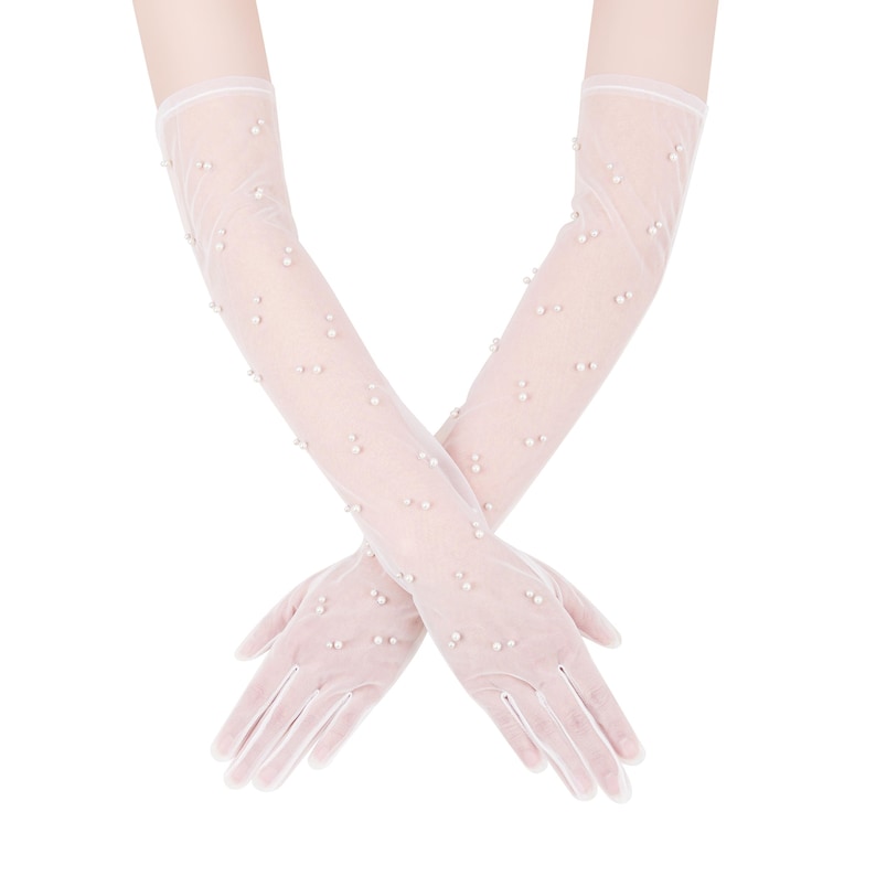 May include: A pair of white long gloves with pearl embellishments. The gloves are made of a sheer, delicate fabric and are perfect for a special occasion.