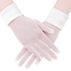 May include: A pair of sheer, pale pink gloves with white cuffs. The gloves are made of a delicate, semi-transparent fabric, and the fingers are slightly curved. The white cuffs provide a contrasting accent to the gloves.