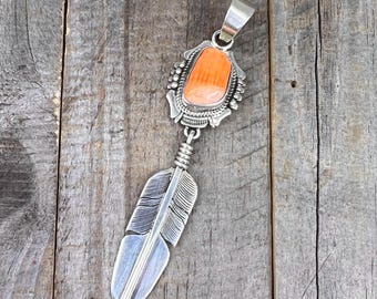 Navajo Made Orange Spiny Oyster Turquoise Pendant with Sterling Silver Feather Bennie Ration