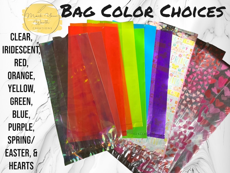 May include: Assortment of cellophane bags in various colors, including clear, iridescent, red, orange, yellow, green, blue, purple, spring/Easter, and hearts. The bags are arranged in a rainbow pattern.