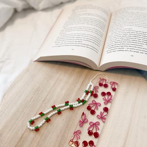 Bookmark, acrylic bookmark, cherry bows, cherries, bows, book merch, cute bookmark, bookmark charm