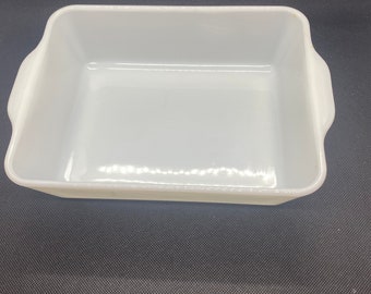 Pyrex White Casserole Dish. Only a small bit of the green design remains. 1 1/2 qt