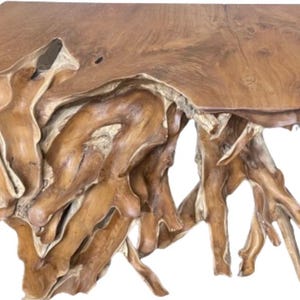 May include: A rustic wooden console table with a natural, organic shape. The table top is made of a single piece of wood with a unique grain pattern. The base is made of multiple pieces of wood that have been joined together to create a unique and eye-catching design.