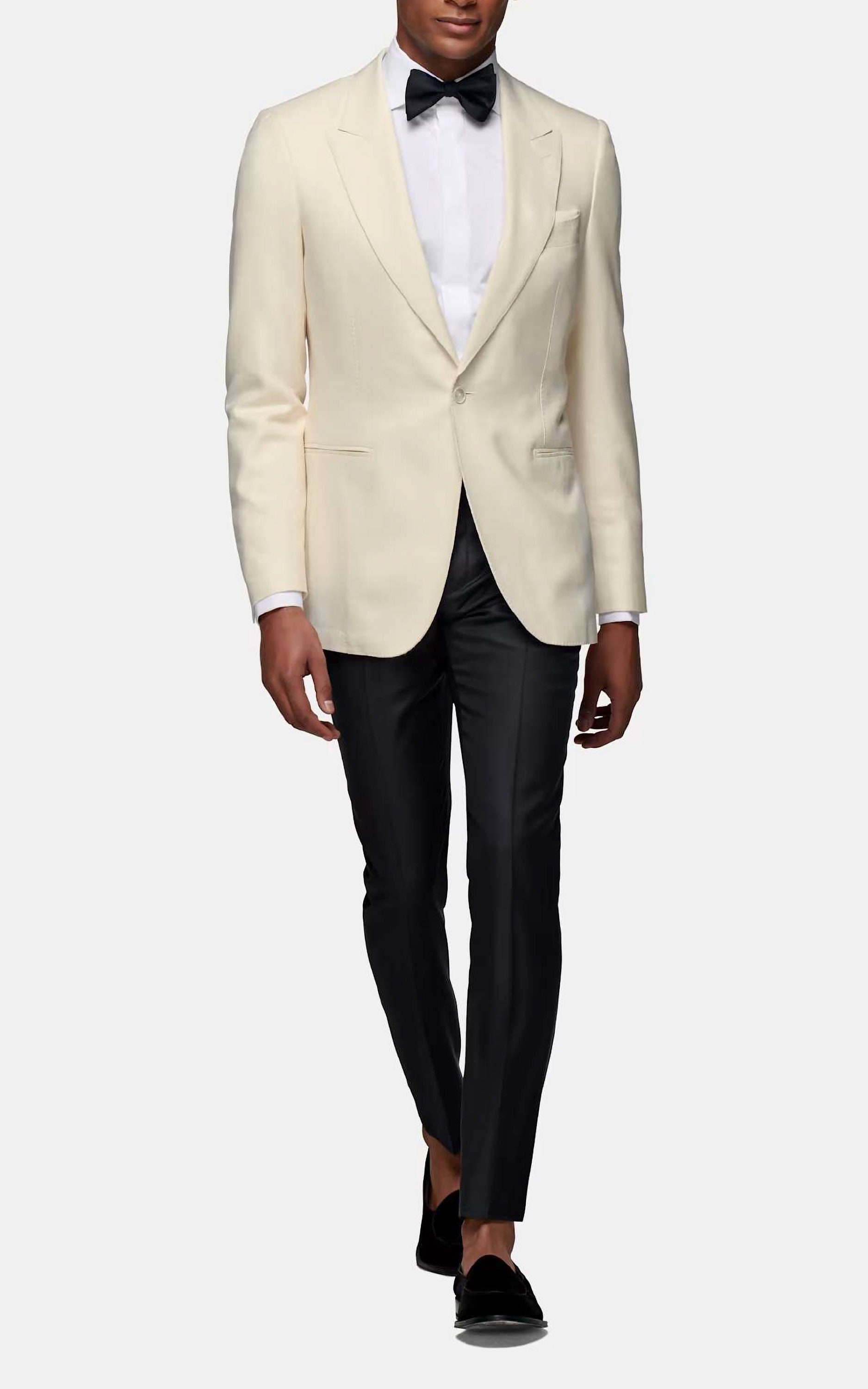 white blazer black pants