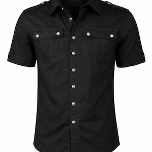 May include: Black short-sleeved shirt with a classic collar and button-down front. The shirt features two chest pockets with button closures and epaulettes on the shoulders. The sleeves are cuffed. The shirt is made of a solid black fabric.