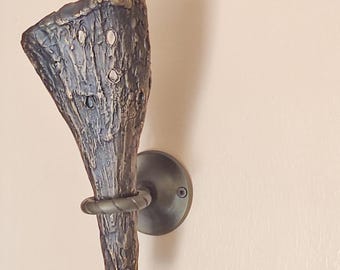 Handcrafted Bronze Wall Sconce with Unique Resin Accents