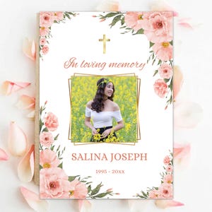 Puede incluir: Una tarjeta de memoria blanca con una cruz dorada en la parte superior y una foto de una mujer en un campo de flores amarillas. El texto "In loving memory" está impreso en rojo sobre la foto. El nombre "SALINA JOSEPH" está impreso en rojo debajo de la foto, y las fechas "1995 - 20XX" están impresas en rojo debajo del nombre.