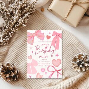 May include: Pink birthday party invitation with a white background and pink bows, hearts, and stars. The text reads "You are invited to Olivia's Birthday Party at 2PM 20 January, 2024 123 Anywhere St., Any City, ST 12345"