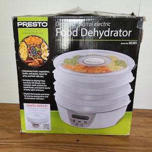 presto 06301 digital electric food dehydrator 6 trays with accessories gently used .Like new.
