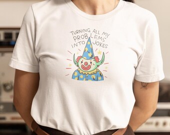 Camiseta con dibujo animado divertido: Convirtiendo los problemas en chistes - Camiseta unisex de algodón