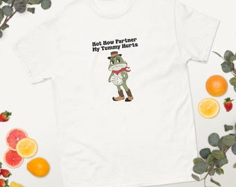 Ahora no, compañero, me duele la barriga, camiseta unisex divertida con la rana vaquera