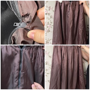 May include: Close-up shots of a brown garment with a zipper, showing details of the fabric and construction. The zipper is black, and the fabric appears to be a smooth, possibly silk-like material. The garment is likely a jacket or coat.