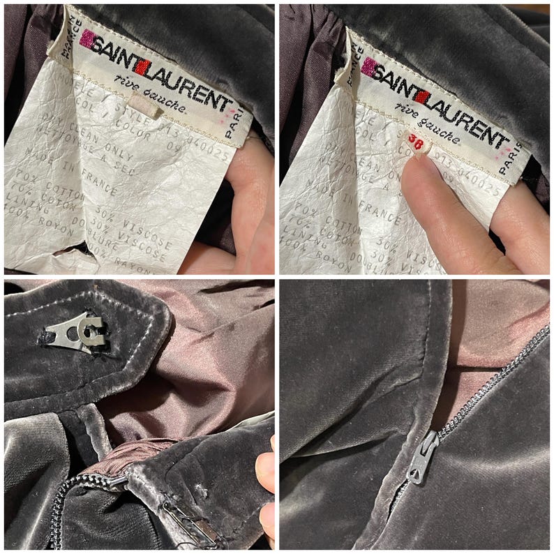 May include: Close-up of a vintage Saint Laurent garment. The label reads "SAINT LAURENT rive gauche PARIS" with details about the fabric composition and care instructions. The garment is a dark gray color, with a zipper and a metal clasp.