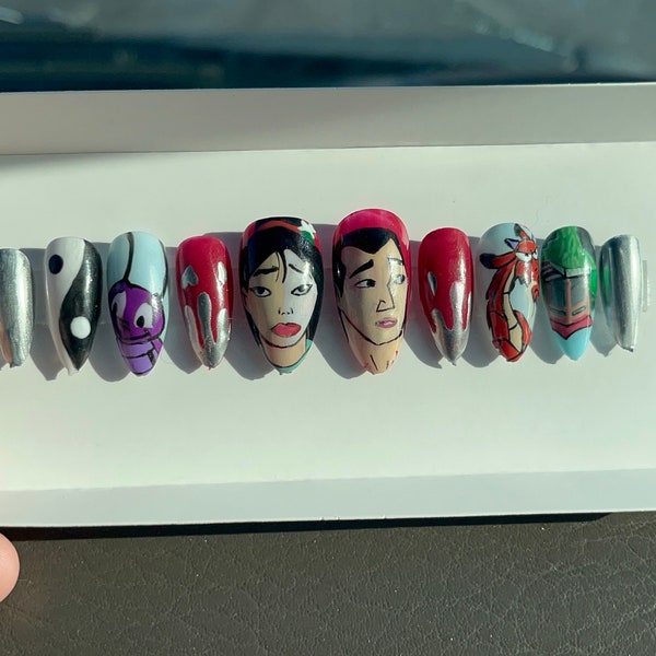 Custom Nails. Just let me know what your wanting and we came make something happen. I can do anime characters, movies, tv shows, Disney etc.