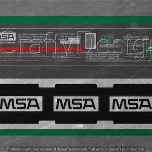 Puede incluir: Una etiqueta negra y verde con el texto "MSA The Safety Company" y "MSA Model Number 7-1348-1 LUXFER Part Number" con una etiqueta de advertencia que dice "A WARNING". La etiqueta también incluye el texto "TC-3CCM-310 DOT-SP 10915-4500 ILLUMEER ACUS REE: 126 8515" y "CONTENTS AIR 66 SCF AT 4500 PSIG AIR COMPRESSED RESPIRABLE AIR".