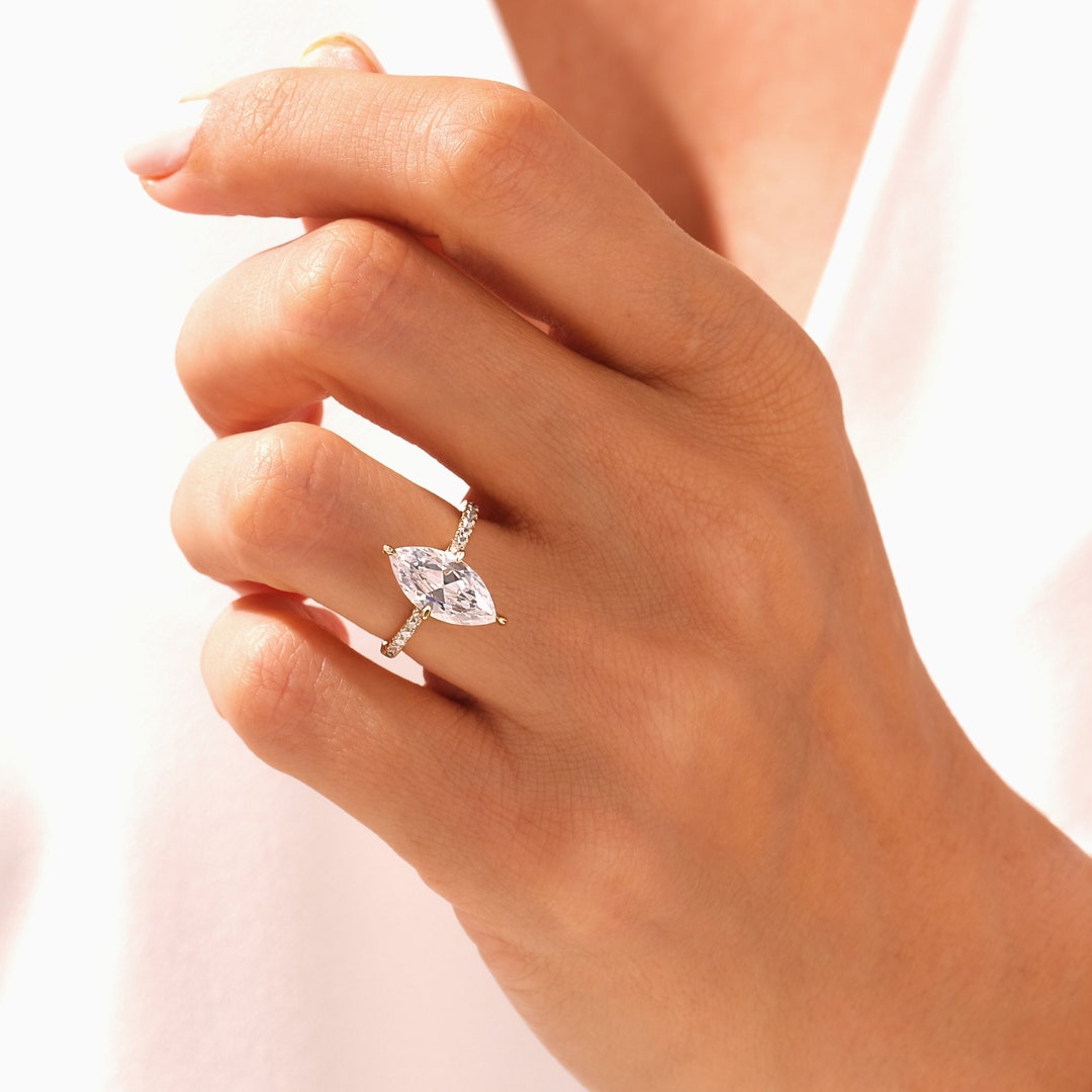 Brilliant Marquise Cut Engagement Ring / Side Stone Accented Promise