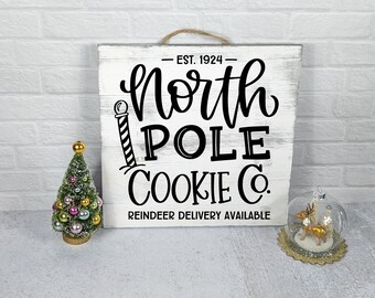 "Handgemachtes ""North Pole Cookie Co."" Weihnachtsschild aus Holz."