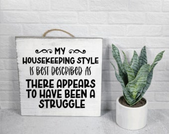 Letrero de madera con divertidas luchas domésticas - Decoración humorística para el hogar