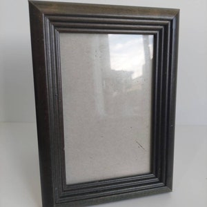 Unique dark leaf Green wooden frame.